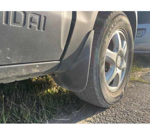 Автомобільні бризговики Hyundai Tucson 2004-2014 (Surtep)